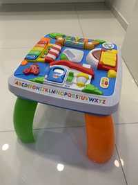 Stolik edukacyjny fisher price super stan niemiecki