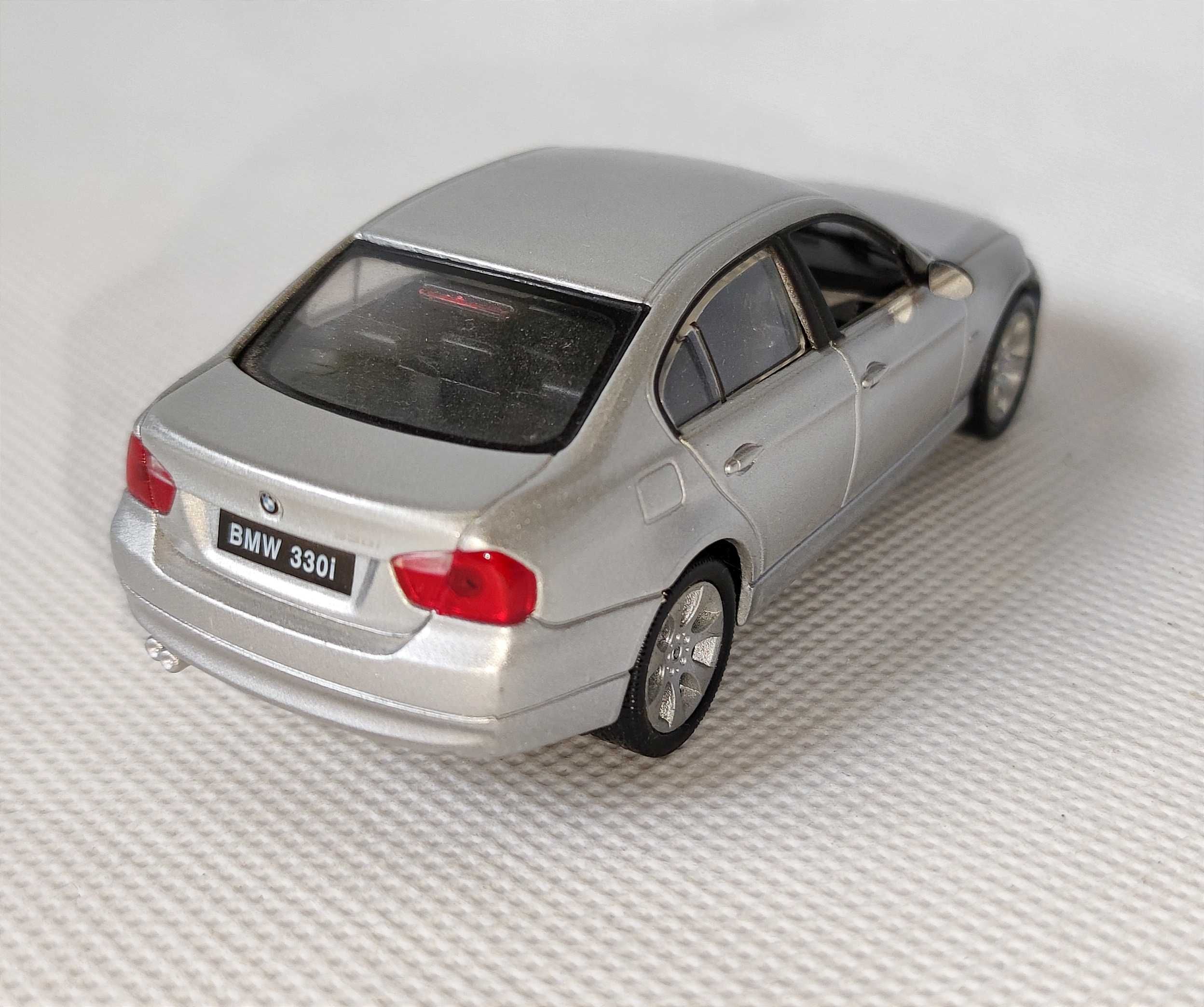 Модель BMW E90 330i Welly 1:43