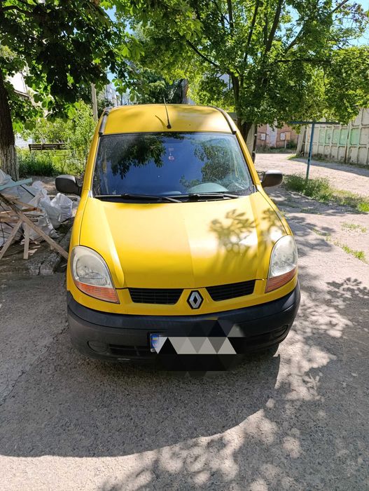 Рено Кенго жовтого кольору