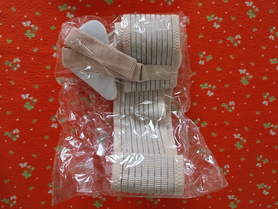 Грижовий бандаж,