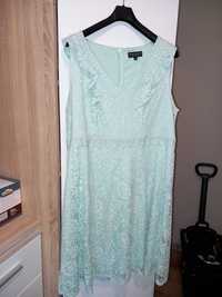 Piękna zielona koronkowa sukienka w rozmiarze 48.Nowa !
