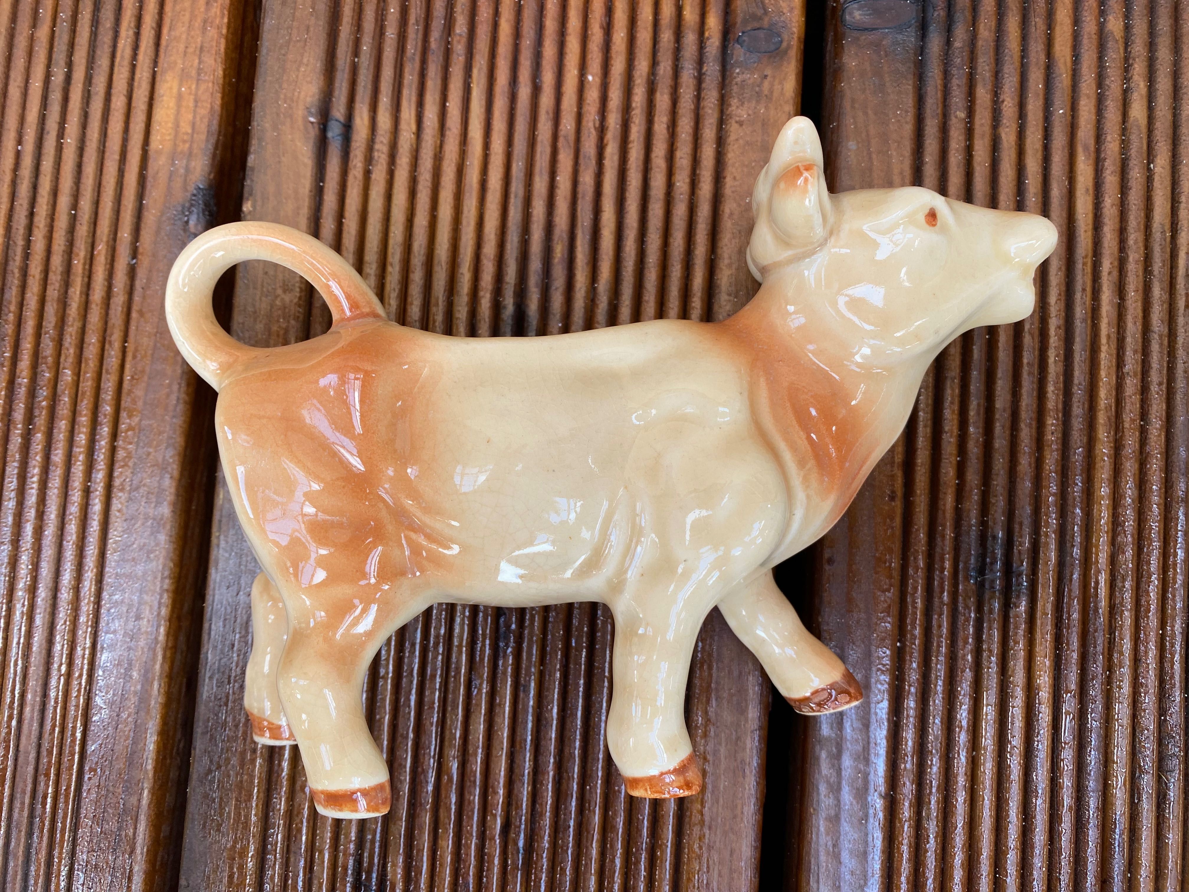 Porcelanowa krowa mlecznik