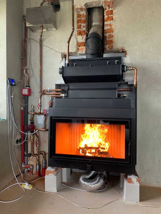 Каміни топки з водяним контуром.Водяним теплообмінником.Продаж,монтаж.