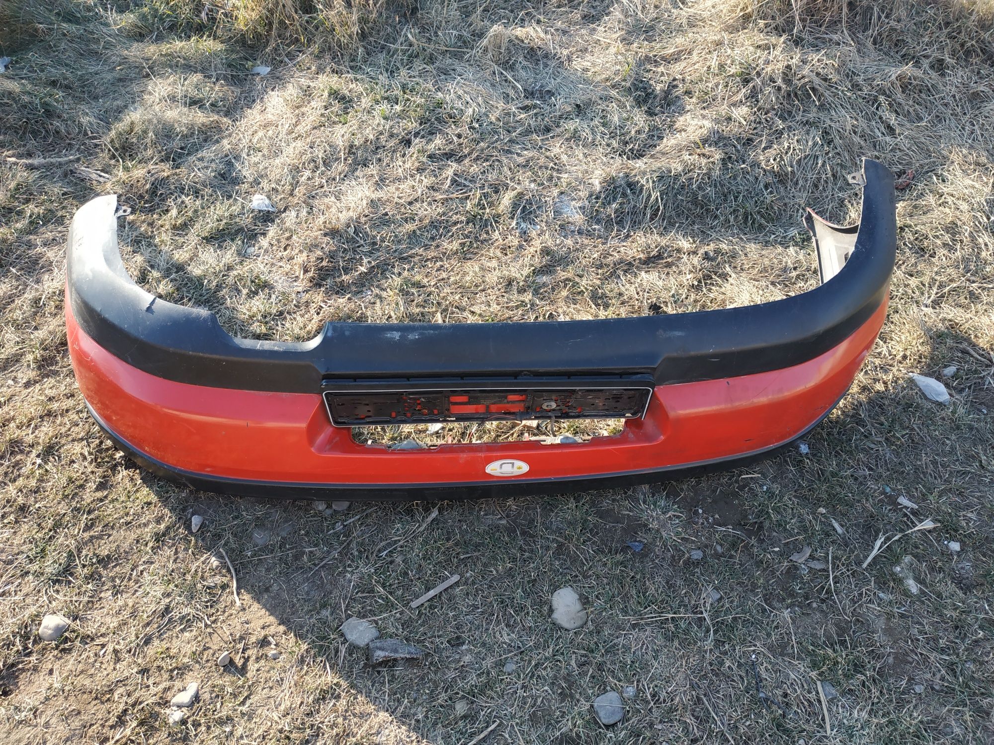 Бампер задній Mazda 323F BA хетчбек