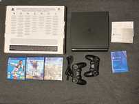 PlayStation 4 Slim 500GB + 2 pady + gry