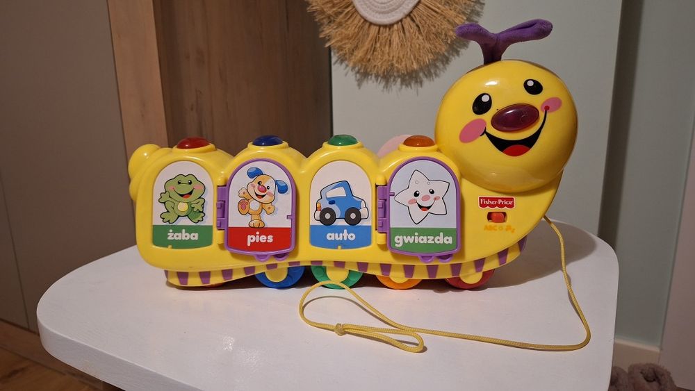 Gąsieniczka fisher price  ciągacz książeczka