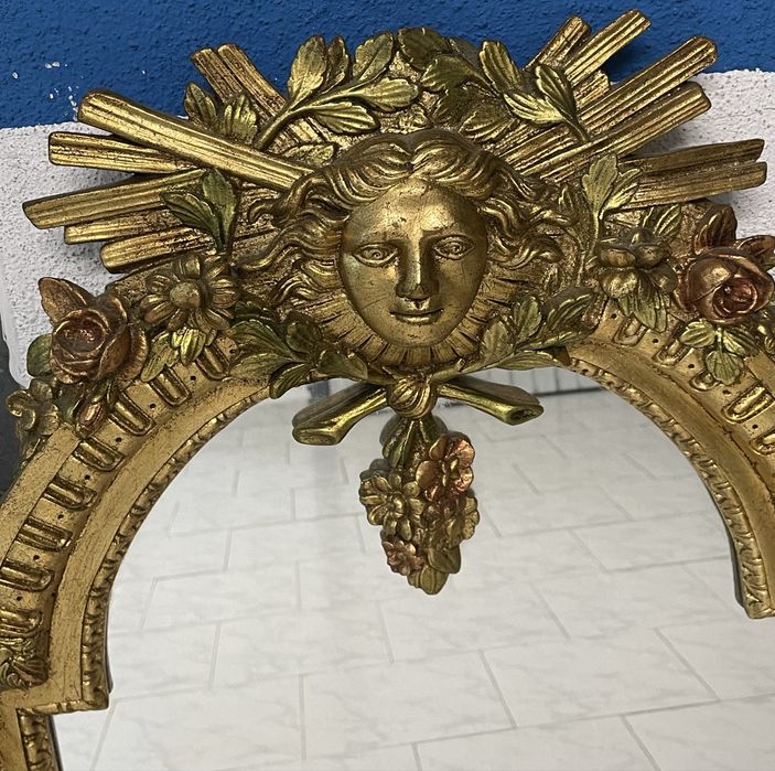 Espelho em talha dourada