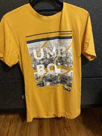 Żółta koszulka z nadrukiem UMBRO