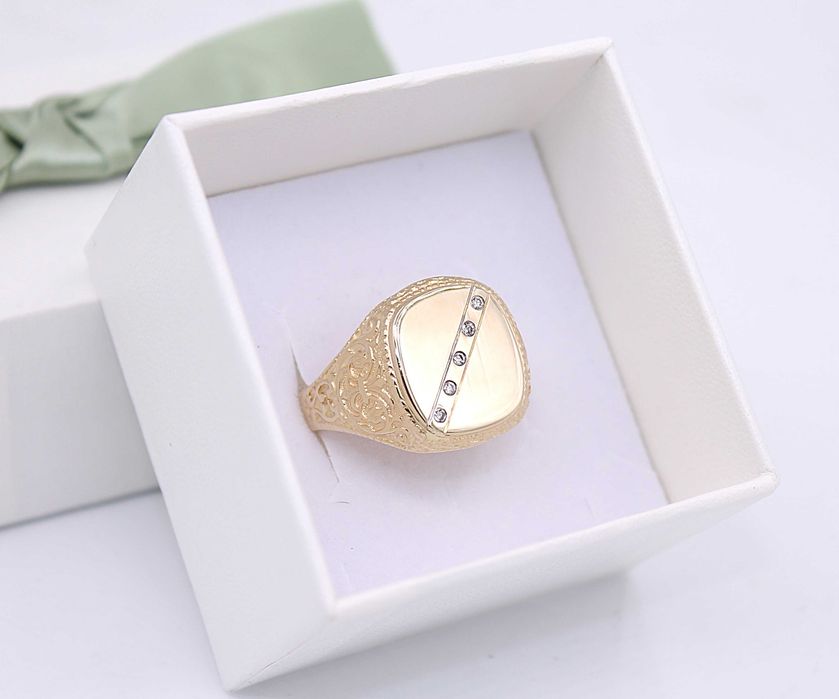 Złoty sygnet p.585/15,38g z brylantami