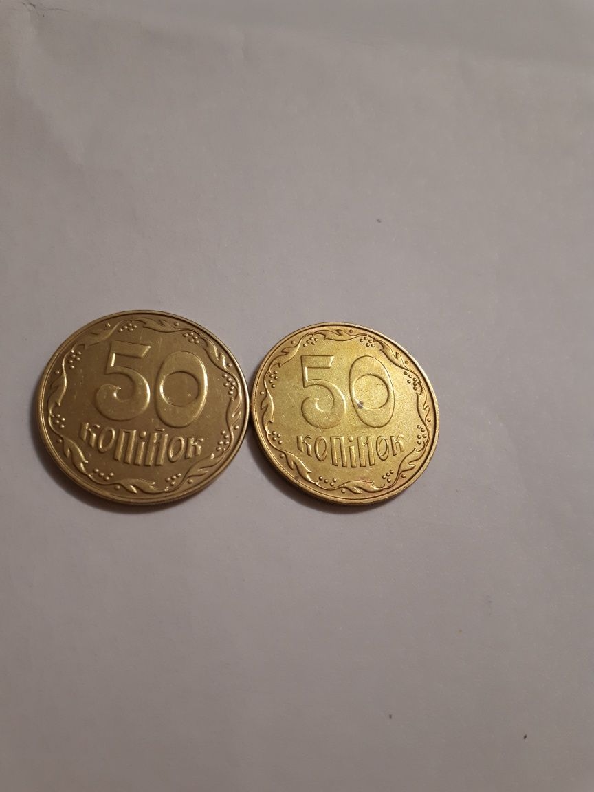Монета Украины 50 копеек 2014 года с обихода  магнитная вес монеты 4.2