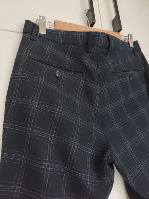 Męskie materiałowe spodnie w kratę, Zara, r. 38