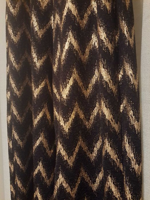 Macacão lefties com dourados