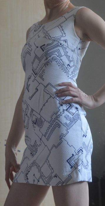 Biała krótka sukienka rozm.34