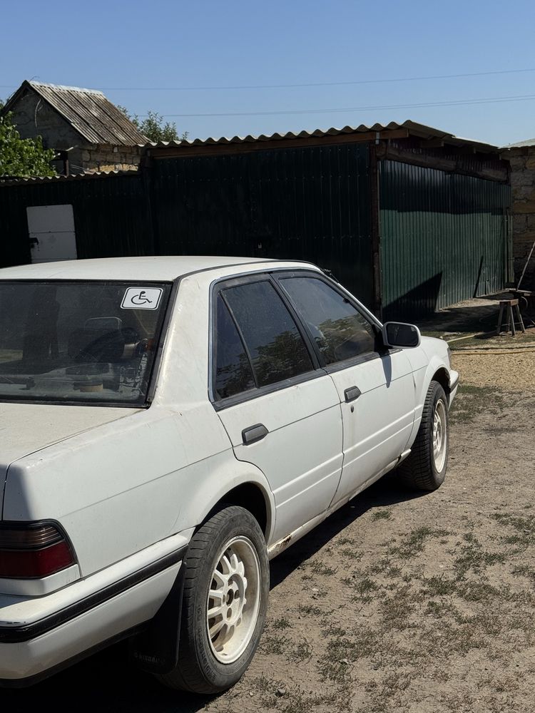 Продам Nissan 1.8 газ бинзин