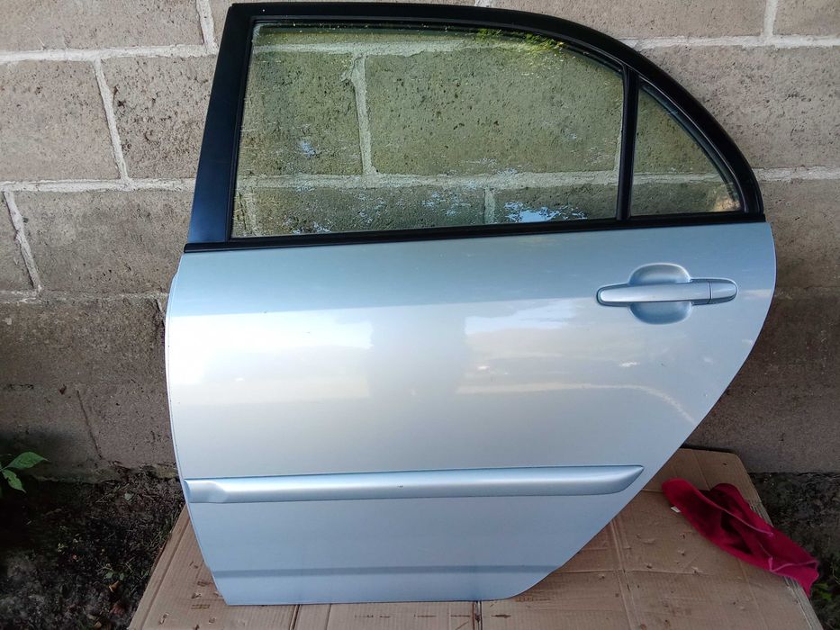 Toyota Corolla e12 drzwi lewe  tylne 8s1 kolor kombi sedan japończyk