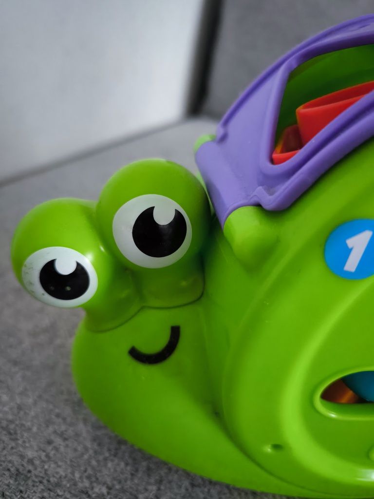 Sorter ślimak Fisher Price zabawka interaktywna edukacyjna