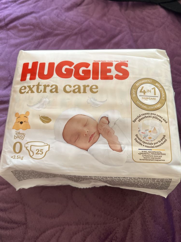 Huggies extra care , pampersy