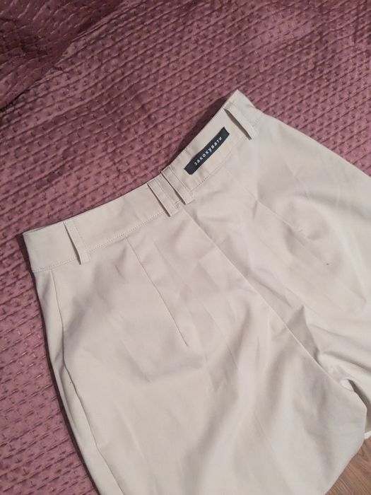 Брюки бежевого кольору