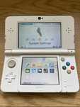 Konsola New Nintendo 3DS + karta microSD 64 GB