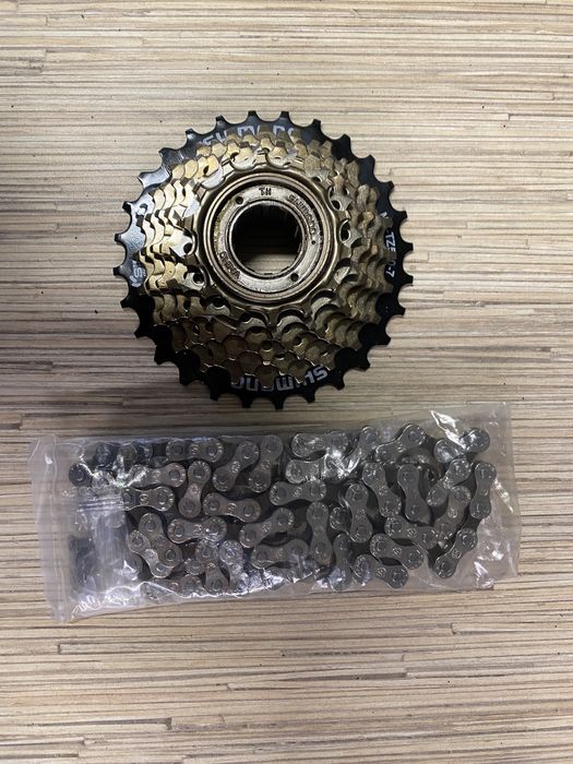 Zestaw wolnobieg Shimano MF-TZ500-7, 14-28 z i łańcuch YBN 7-8 rzędowy