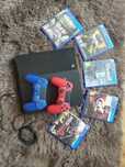 Konsola PS4 1 TB +2 pady + gry