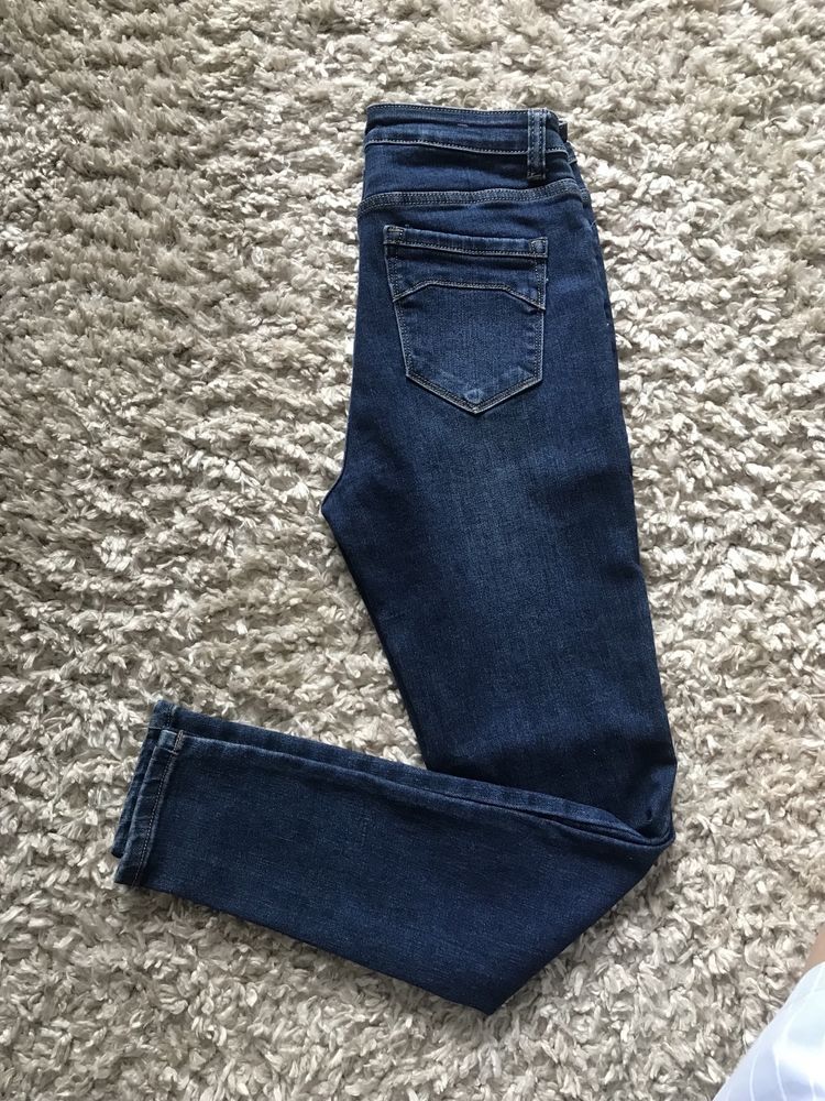 Damskie spodnie jeansowe r.40 NOWE