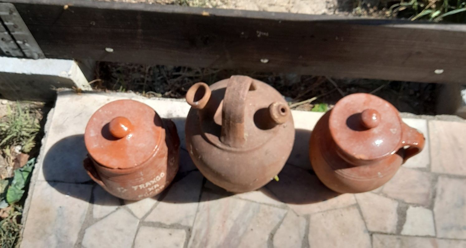 Potes  em barro talhas