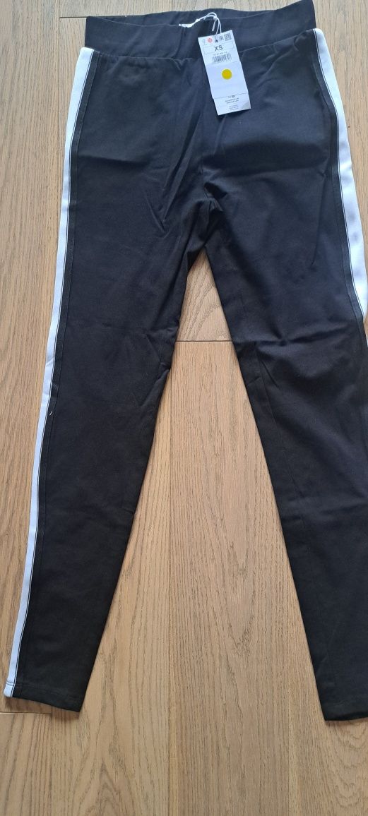Nowe z metką  legginsy