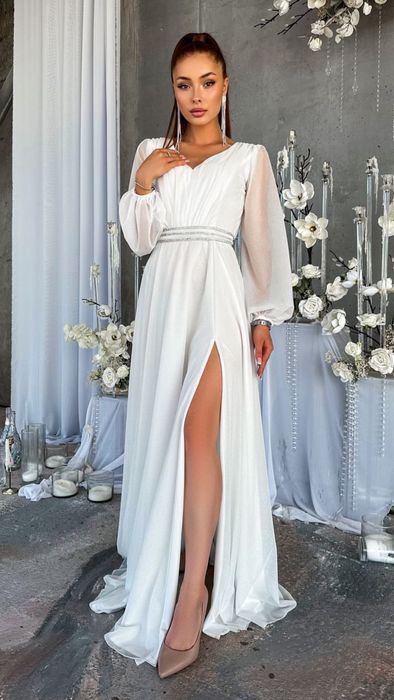 Продам весільну сукню 48р