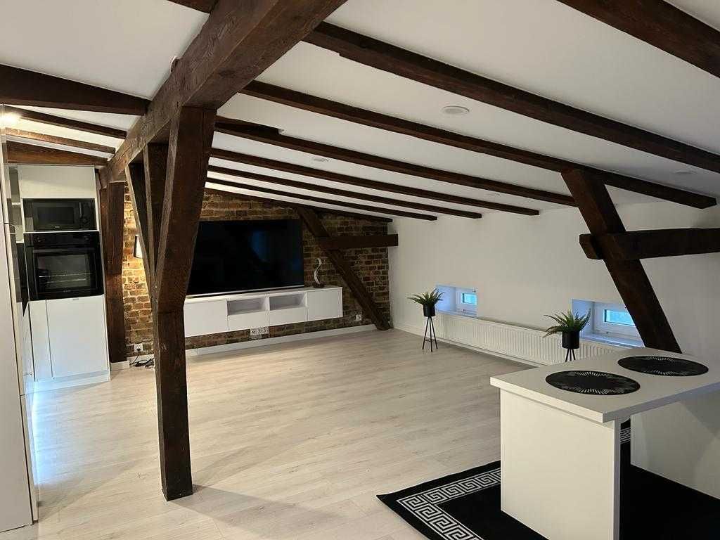 Września Rynek- Stylowe poddasze 65 m2 do wynajęcia