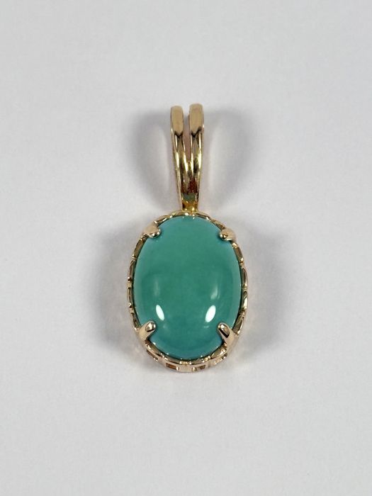 Złota zawieszka z turkusem