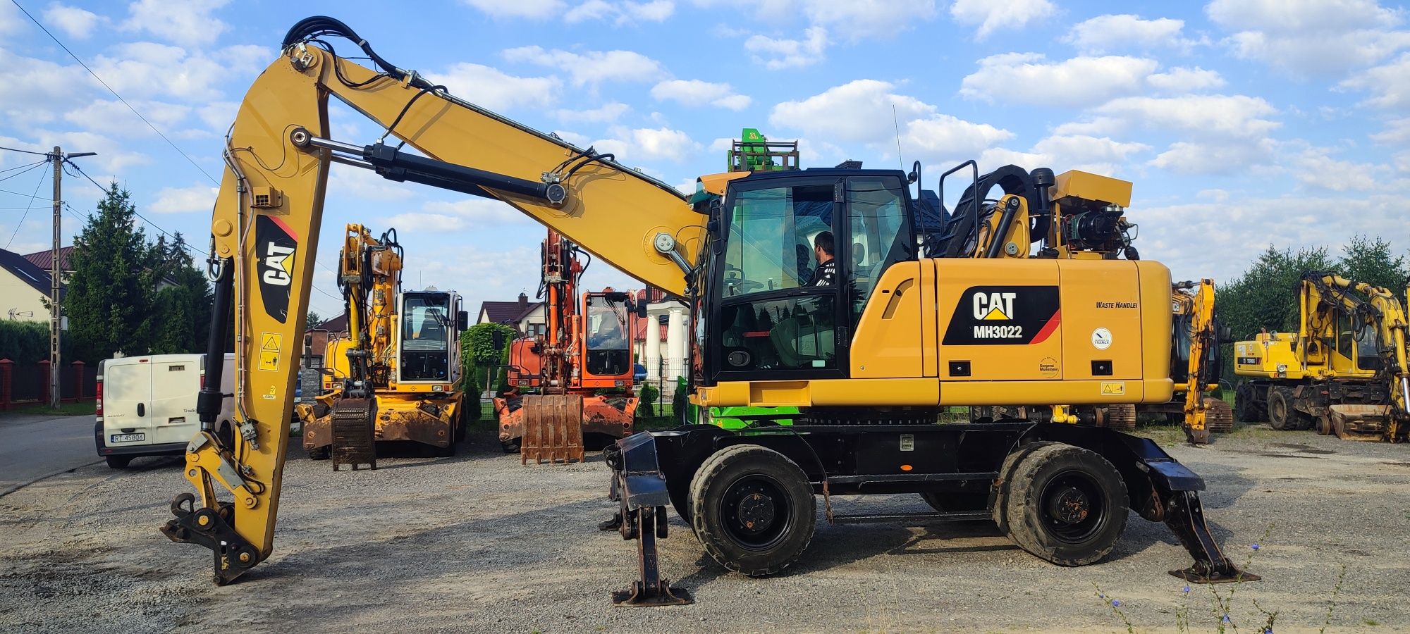 Koparka przeladunkowa CAT MH 3022 koparka do złomu fusch liebherr cat