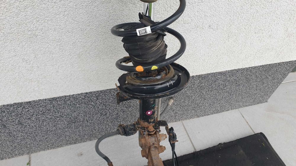 Renault Clio 4 IV mcpherson lewy przód amortyzator piasta 1.2 16V