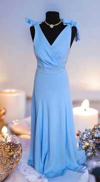 Długa niebieska sukienka z rozcięciem