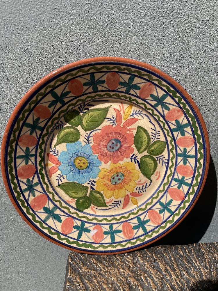 Quatro pratos decorativos