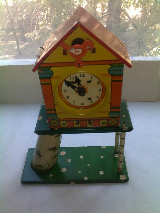 Детская жестяная заводная игрушка с ключиком ссср часы часики птичка