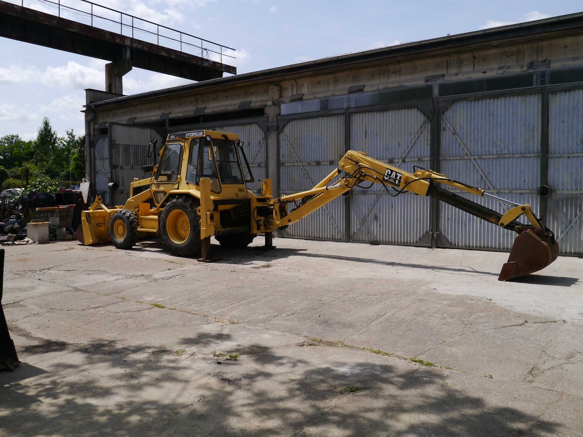 Koparko-ładowarka Caterpillar 428, 1990r