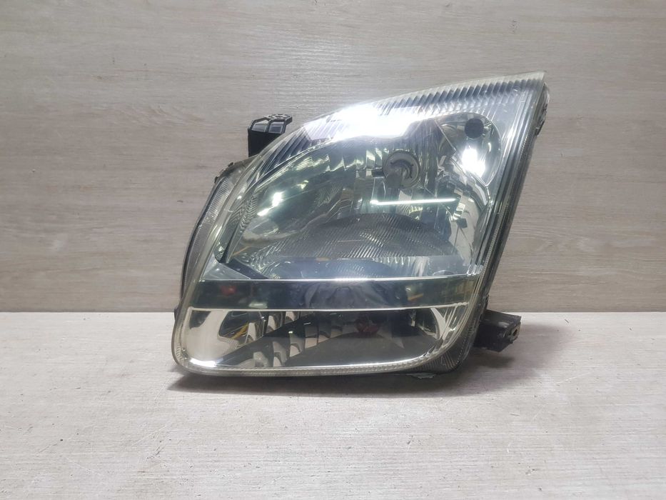 Фара ліва Suzuki Ignis 2003-2008p.