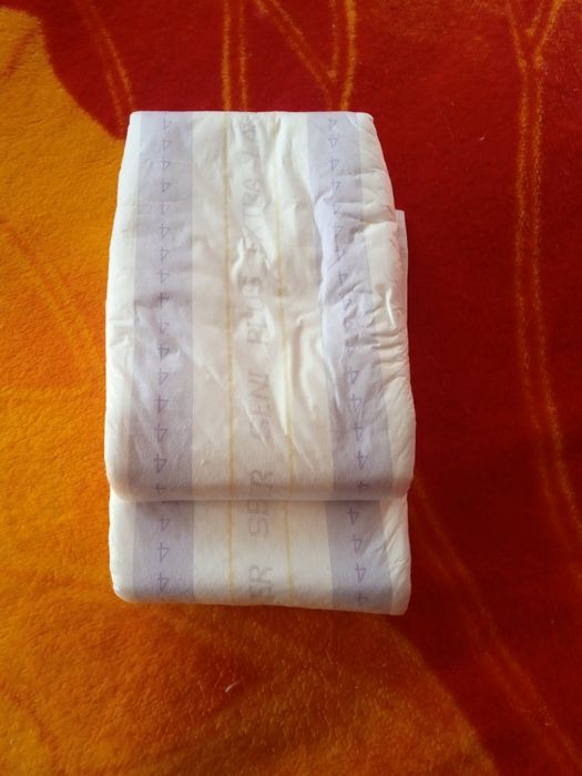 Одноразовые пеленки и памперсы