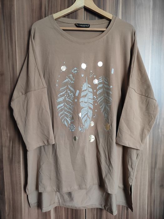 Ładna nowa bluzka z mieniącymi piórami rękaw 3/4