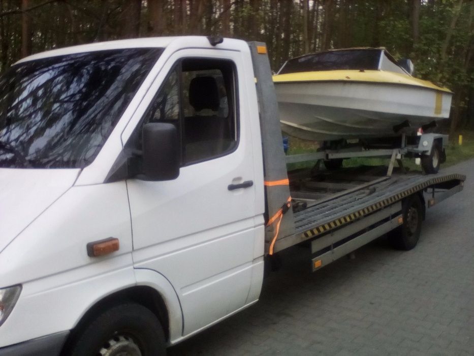 Auto laweta Transport Niemcy Auto Pomoc Tanio Dzwoń 24H.