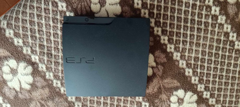 Playstation 3 + comandos move + 2 jogos sports champions + 5 jogos Ps3