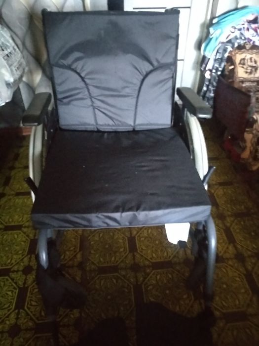 Инвалидная коляска.