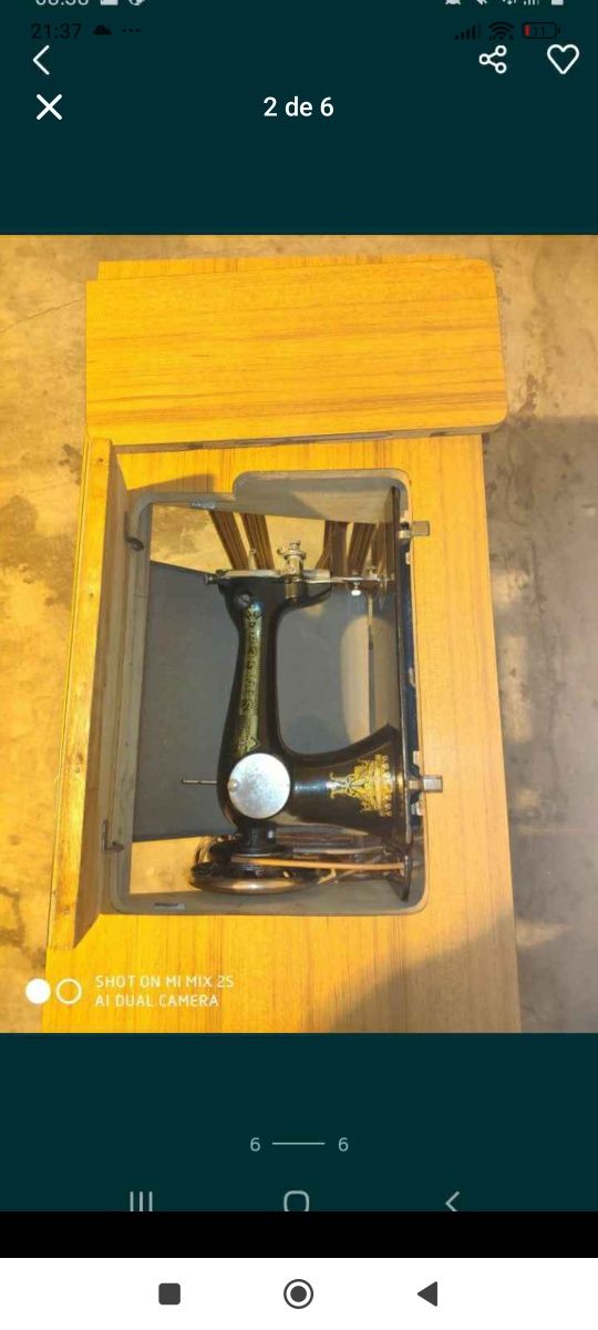 Máquina de costura singer