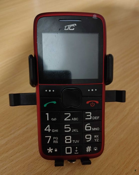 Uchwyt na telefon komórkowy mocowany na kratkę nawiewu