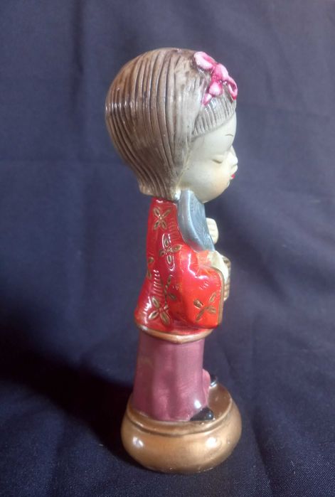 Boneca antiga com 21cm alt.
