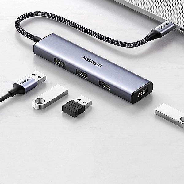 Ugreen rozdzielacz HUB USB Typ C - 4x USB 3.2 Gen 1 srebrny (CM473, 20