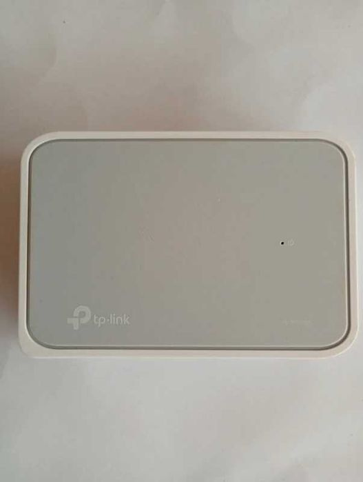 Switch de Rede TP-Link TL-SF1005D + Fonte de Alimentação + Manual