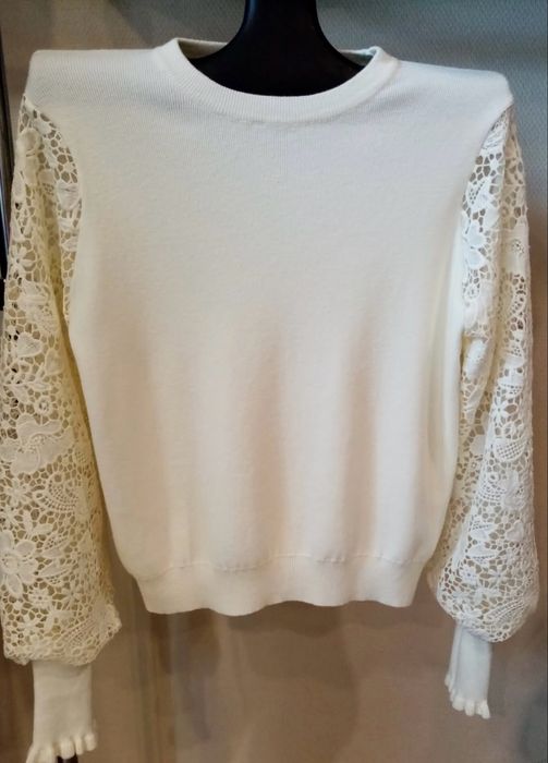 Nowy sweter z metką