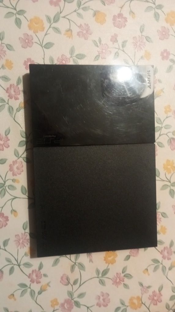 PlayStation 2 Slim usado em bom estado + Acessórios e cabos